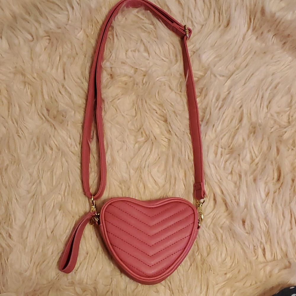 Gently used wild fable pink heart shaped purse